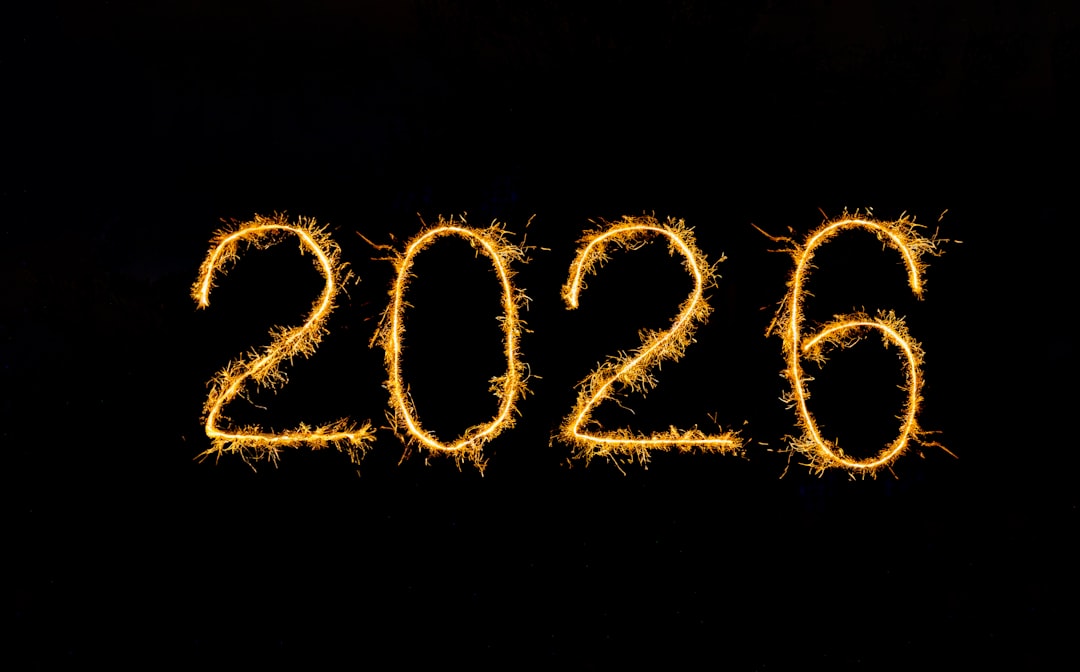Photo by Moritz Knöringer The numbers 2026 written in sparklers on black background