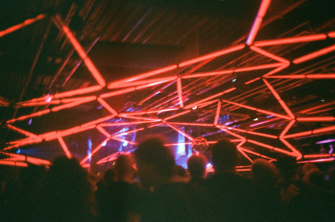 The numbers 2026 written in sparklers on black background